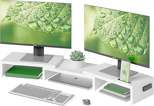 desk setup with laptop and monitor